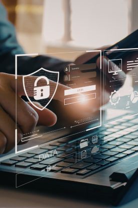 remote worker signing into secure laptop for cybersecurity